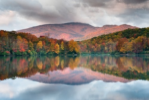 The Blue Ridge Parkway experience, also known as "America's Favorite Drive," is unlike any other: a slow-paced and peaceful drive that reveals spectacular long-range panoramas and close-up views of the Appalachian Highlands' majestic mountains and pastoral landscapes.