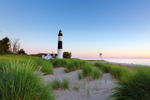 Standing on the shores of Lake Michigan, with its vivid blue waves, cool air, and diverse shorelines, it's difficult to realize you're looking at a lake rather than an ocean. 