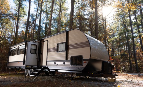 RV stored outdoors in backyard