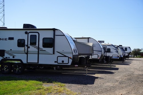 RVs on a dirt lot for sale