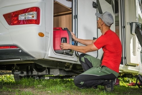 man holding an RV generator